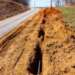 Trench next to gravel road